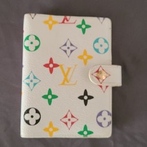 Authentic Louis Vuitton address book.